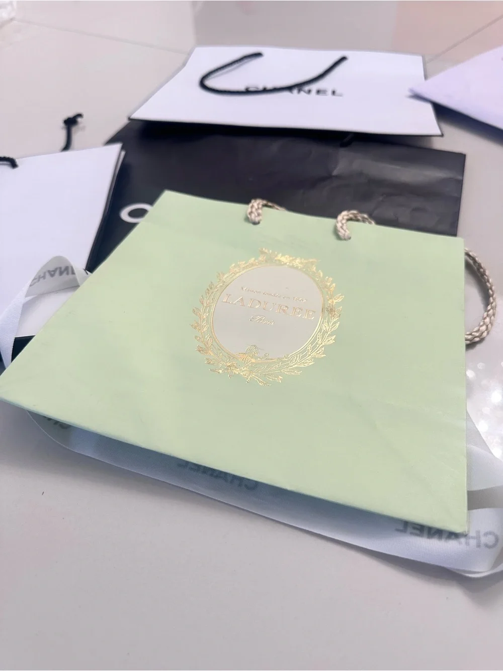 Luxury shopping bag Laduree, Chanel, MFK Kurdjian shopping bag